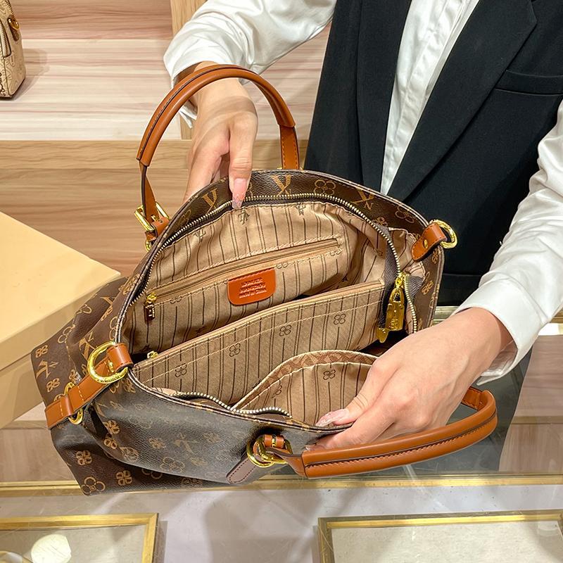 Large capacity shoulder bag, genuine leather hand-held, crossbody, or tote bag.